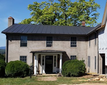 Existing house was finished with custom color masonry cement.