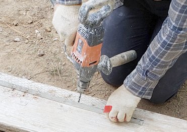 Weeps are made by drilling 3/4 inch plaster stop