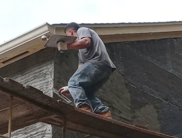Two layers of tar paper, self furring metal lath
