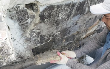 Back side of chimney is easily crumbled in Alexandria, Virginia.