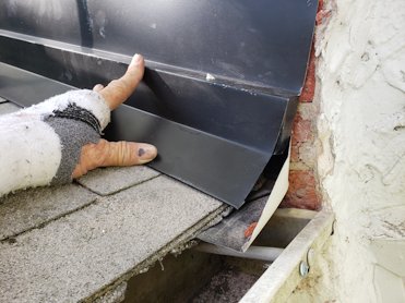 A new counter flashing is put on.