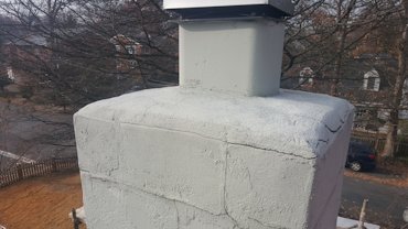 My competition stuccoed this chimney in Arlington, Virginia