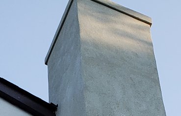 A solid cement band is added to the top of the chimney.
