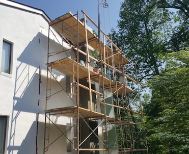 Top of the sill is angled down with white mortar.