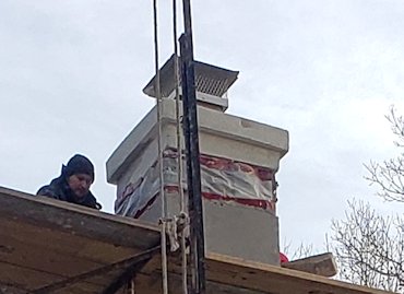 A band at the top forms a drip edge deflecting water.