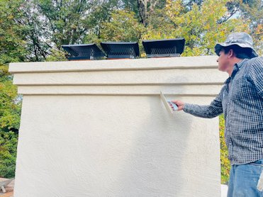 Decorative bands provide a drip edge.
