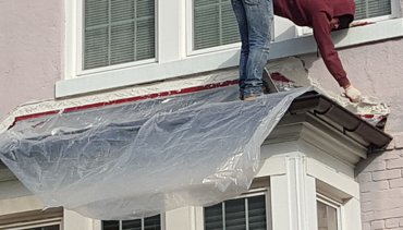 We overlapped the flange with our stucco stop flashing and filled in.