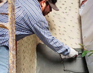 failure of the stucco in Great Falls, Virginia