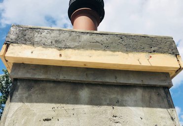 Metal lath is nailed on and the bands are filled in.