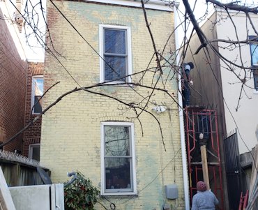 Townhouse stuccoed in the Shaw area of Washington, DC