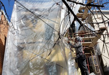 A plastic heat tent for cold weather stucco in Washington, DC