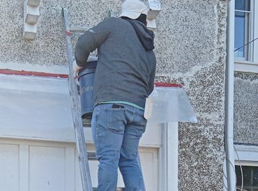 Aggregated stucco gets extensive repairs Takoma Park area in Washington, DC.