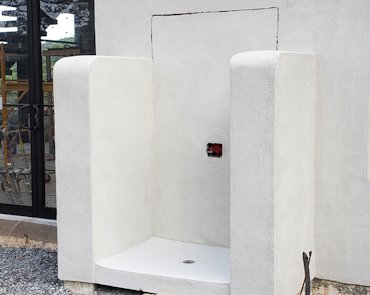 Outdoor stucco shower in West Virginia