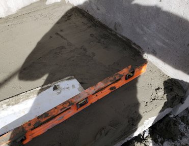 floor is browned out using a level