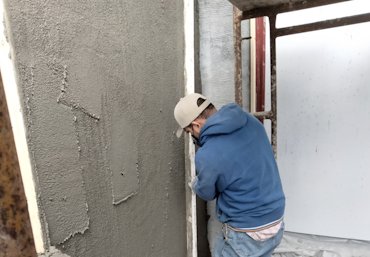 wall is filled and rodded off.