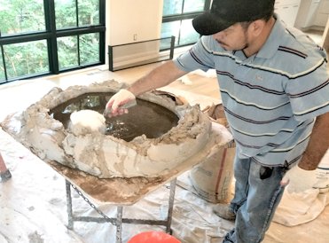 Pebble dash stucco replaced on this 1923 house in Washington, DC.