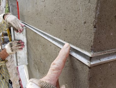 Mortar scraped back to allow room for the finish coat.