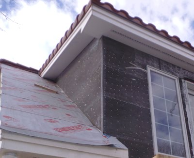 The
              tarpaper and lath weren't horrible