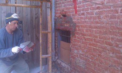 Wood lintel
              replaced with steel