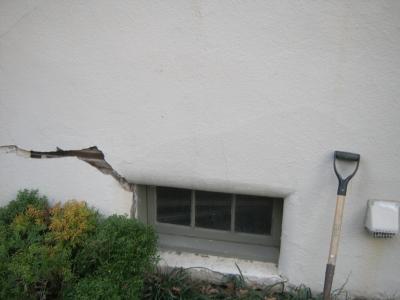 The last re-stucco was already
              failing