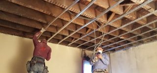 The ceiling is furred down with RC-1 channel.