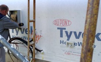 the electrical panel is mounted on a one inch spacer