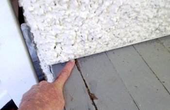 Porch was done in 2003 leaving a gap between
the bottom of the stucco and the porch