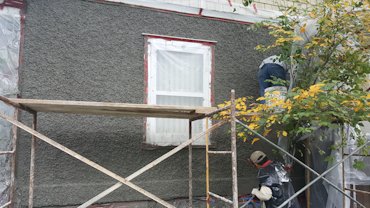 Pebble dash stucco replaced on this 1908 house in Washington, DC