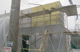 metal framing and the gypsum board on the parapet wall