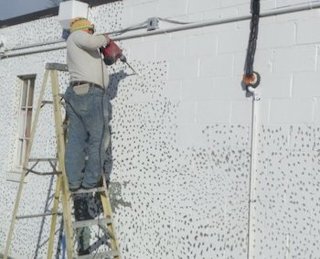 stucco over painted brick or block