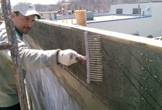 mortar is scratched off, or scarified