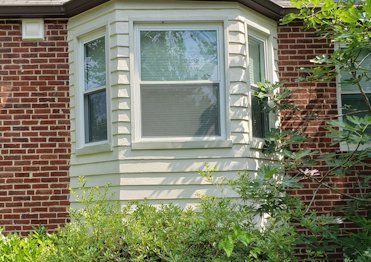 Stucco done to look like siding in Takoma Park