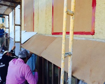 Tearing off the stucco in Purcellville, Virginia