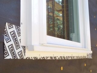 window is wrapped with a peel
              and stick rubber pan flashing.