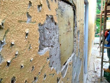 textured paint that was peeling off in Washington DC.