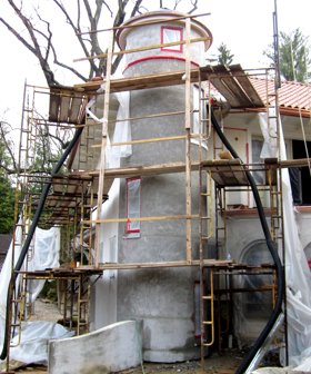 The brown coat on this stucco stair tower is
round and straight.