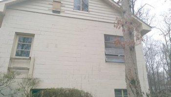 BEFORE:
The painted block garage is stuccoed to match.