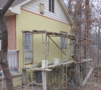 AFTER:
Stucco matches the house.