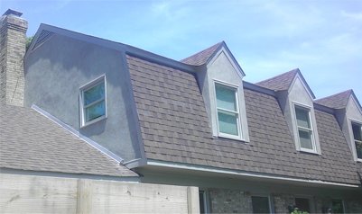 Replacing
                vinyl siding with stucco. Potomac, Maryland