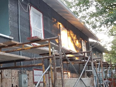 Old lime and sand stucco removed, Two layers of tar paper and self-furring metal lath
	    put on in Takoma Park, Maryland