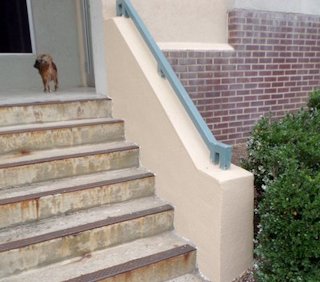 Stucco on the stairway.