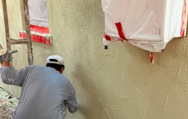 Stucco finish is colored white cement, white lime, and white sand in Washington, DC.