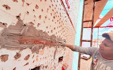 stucco over a painted surface in Washington, DC.