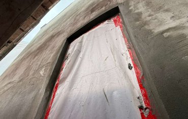 Window returns are filled in and squared up.