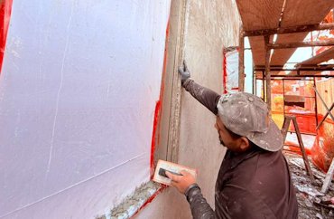 Window returns are trued up by holding a straight edge.