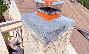 rubber membrane and metal lath for new stucco.