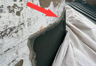 flashing should go under the stucco.