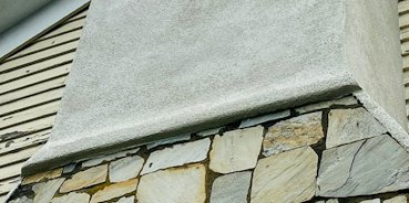 Roll detail caps the edge of the stones