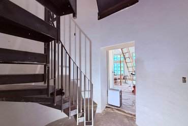 bullnoses, or round arrises, around the door opening.