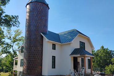 Old silo becomes a stair tower.